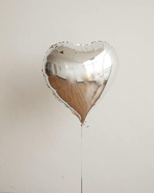 Metallic foil silver heart balloon