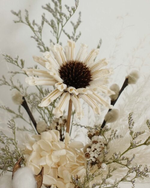 Handmade wooden flower details.