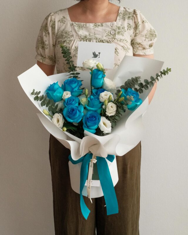 Valentine's Tiffany Blue bouquet with blue roses and white lisianthus